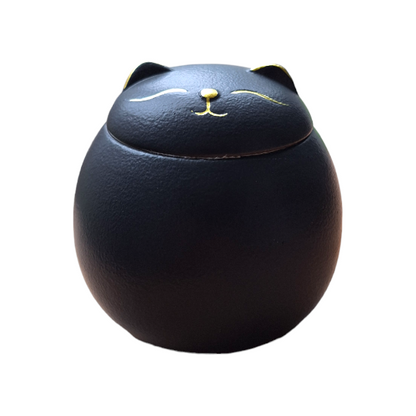 schattige mini-urn in de vorm van een katje - Inhoud: 125 ML -
Afmeting: 7.5 x  H 8 cm -
Materiaal: Keramiek